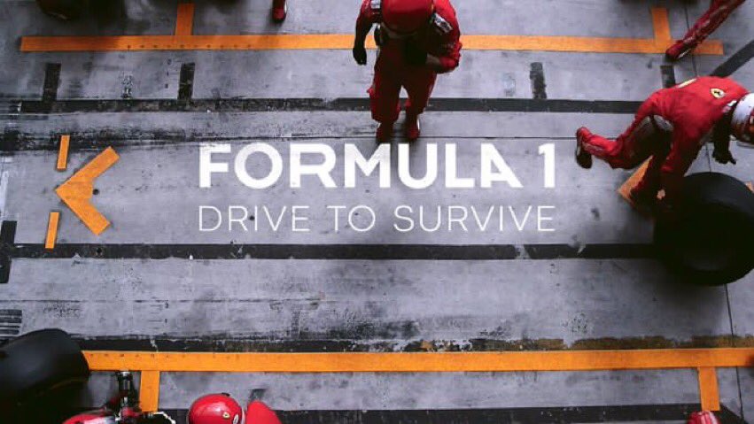 Image tirée de la série Formula 1 présentant des hommes d'écurie de formule 1.