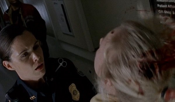 Beth se prend une balle dans le crâne.